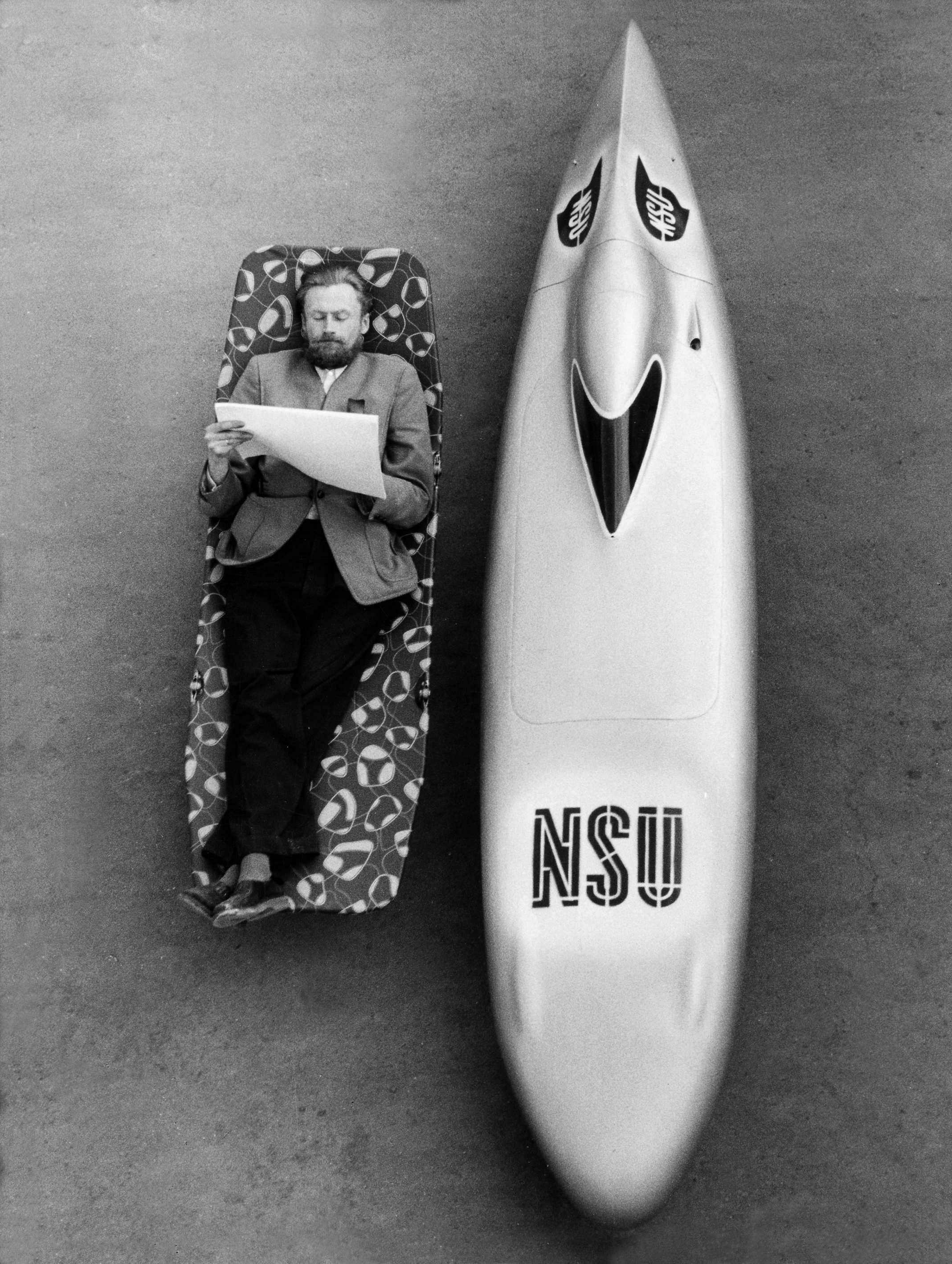 Der doppelte Liegestuhl: Der gelernte Graphiker Gustav Adolf Baumm schuf mit Hilfe der NSU Techniker eine besonders strömungsgünstige Vollverkleidung und nannte sie den "Baummschen Liegestuhl". 1954 knackte er damit elf bestehende Weltrekorde