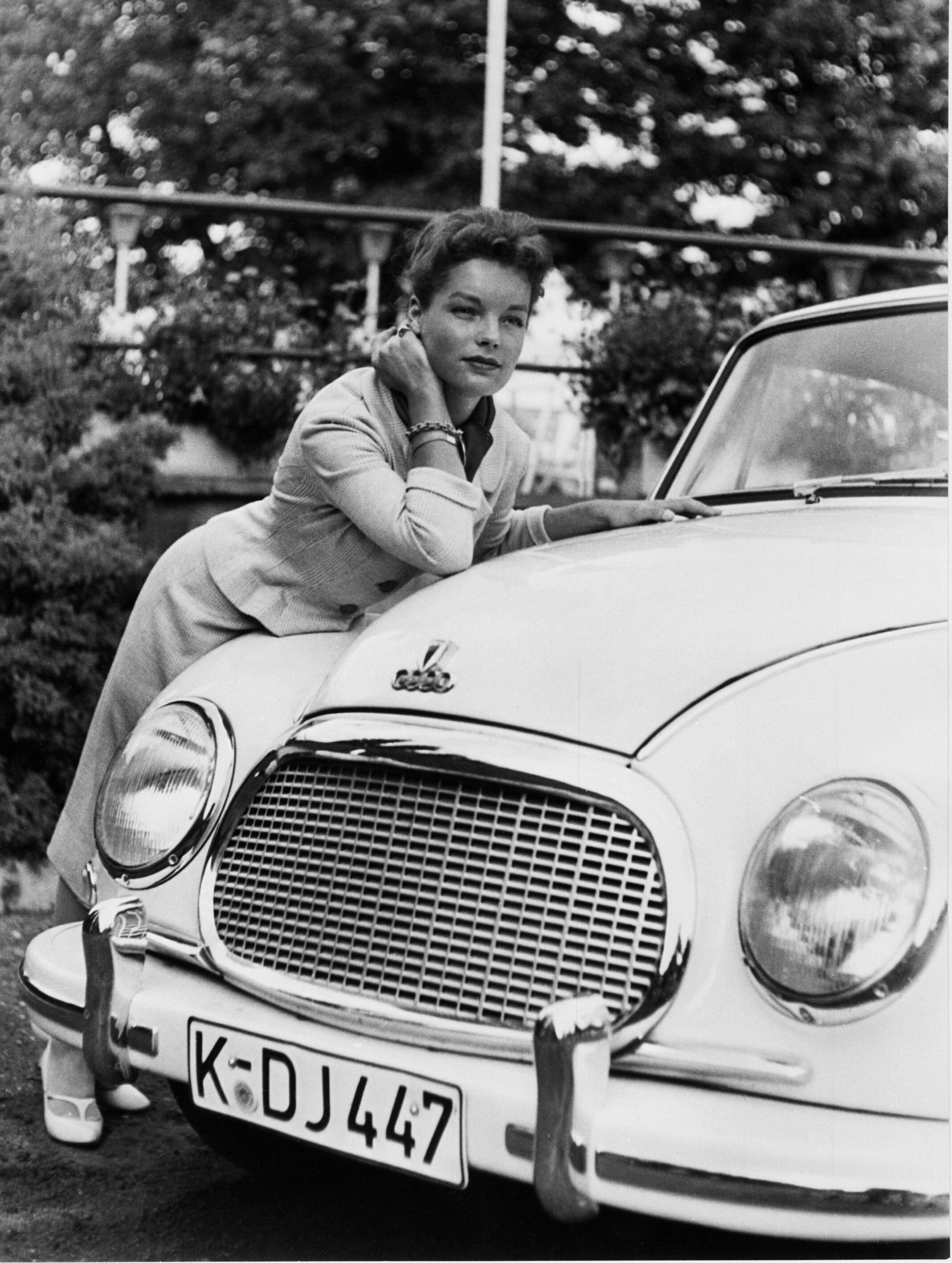 Actress Romy Schneider with an DKW 3=6 F 93 built in 1957