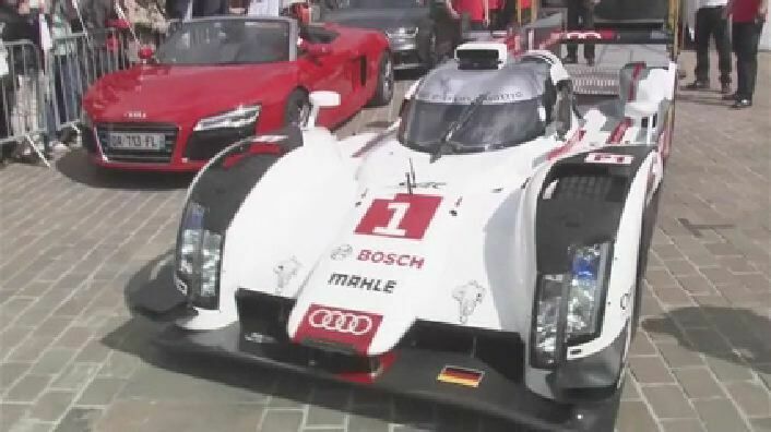 Audi presents the new R18 in urban traffic at Le Mans